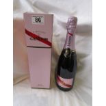 Bottle of Mumm champagne in box