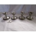 2 pairs of silver candle holders