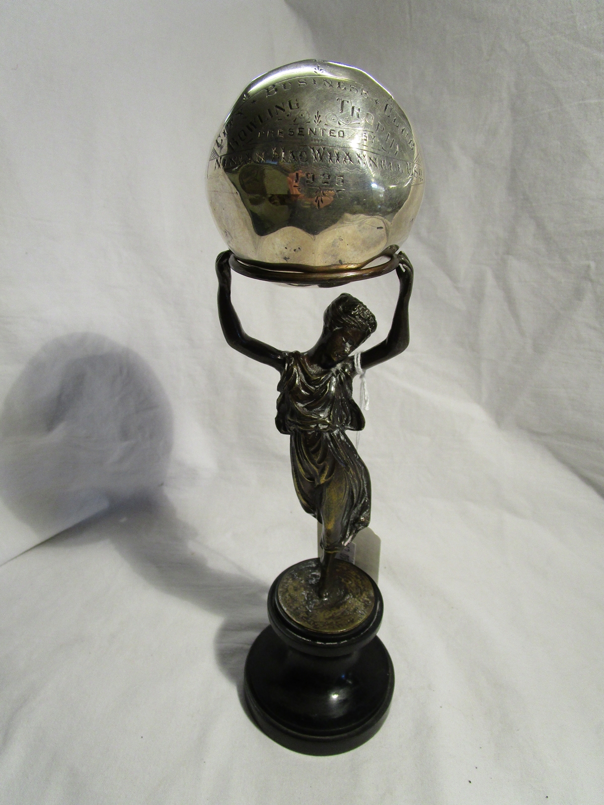 Bowling trophy with hallmarked silver ball top