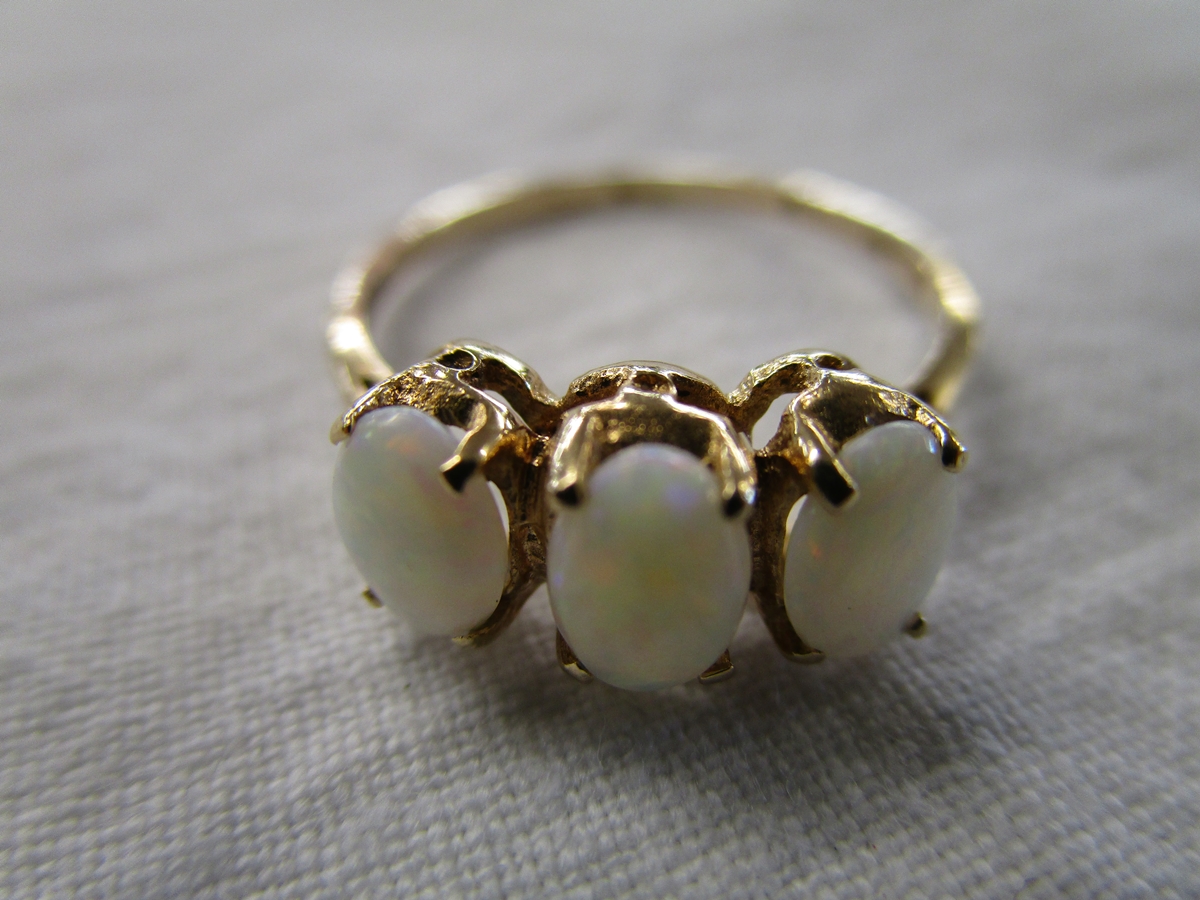 Gold 3 stone opal ring