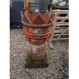 Chimney pot with crowned top