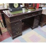 Mahogany and leather top pedestal desk