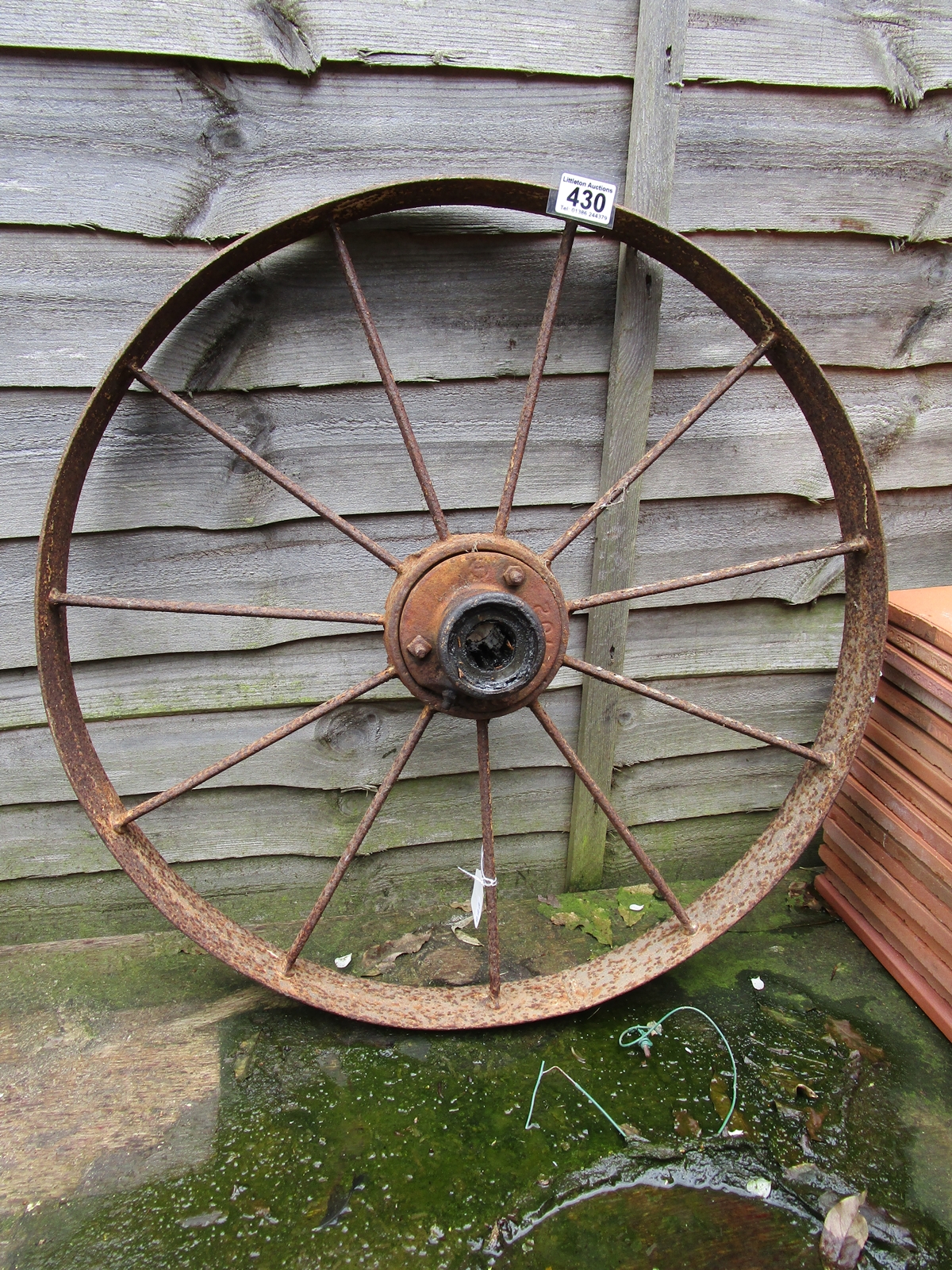 Small cast iron cart wheel