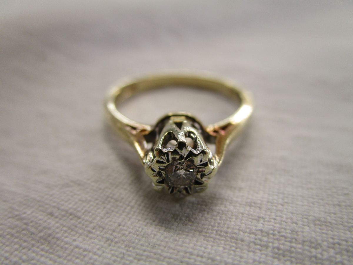 Gold diamond solitaire ring