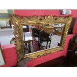 Ornate gilt framed wall mirror