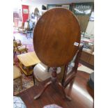 Early mahogany oval tripod table