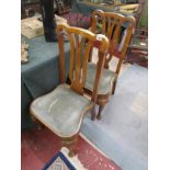 Pair of walnut dining chairs with cabriole legs
