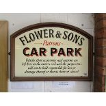 Flower & Sons car park sign