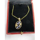 Gold Forget me knot sapphire & diamond pendant on gold chain