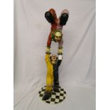 Tumbling clowns sculpture