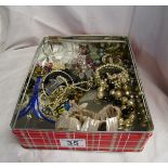 Tin of vintage costume jewellery & silver items