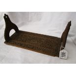 Early 20th century heavily carved Indian sandalwood book pull/trough