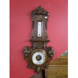 Carved barometer