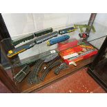2 shelves of Hornby engines, carriages & track