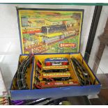 Boxed tin plate & clockwork train set by Wells Brimtoy