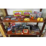 Two shelves of diecast cars to include Dinky