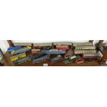 Shelf of model locomotives, carriages etc to include Tri-ANG