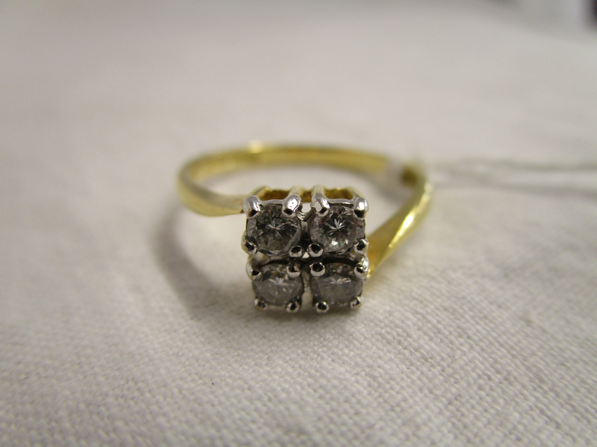 18ct gold 4 stone diamond ring