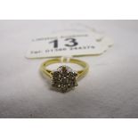 18ct gold diamond cluster ring (Approx 0.5 Ct. of diamonds)