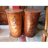 Pair of Sheesham wood circular 5 drawer cabinets