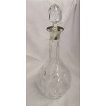 Cut glass tear drop decanter with silver collar