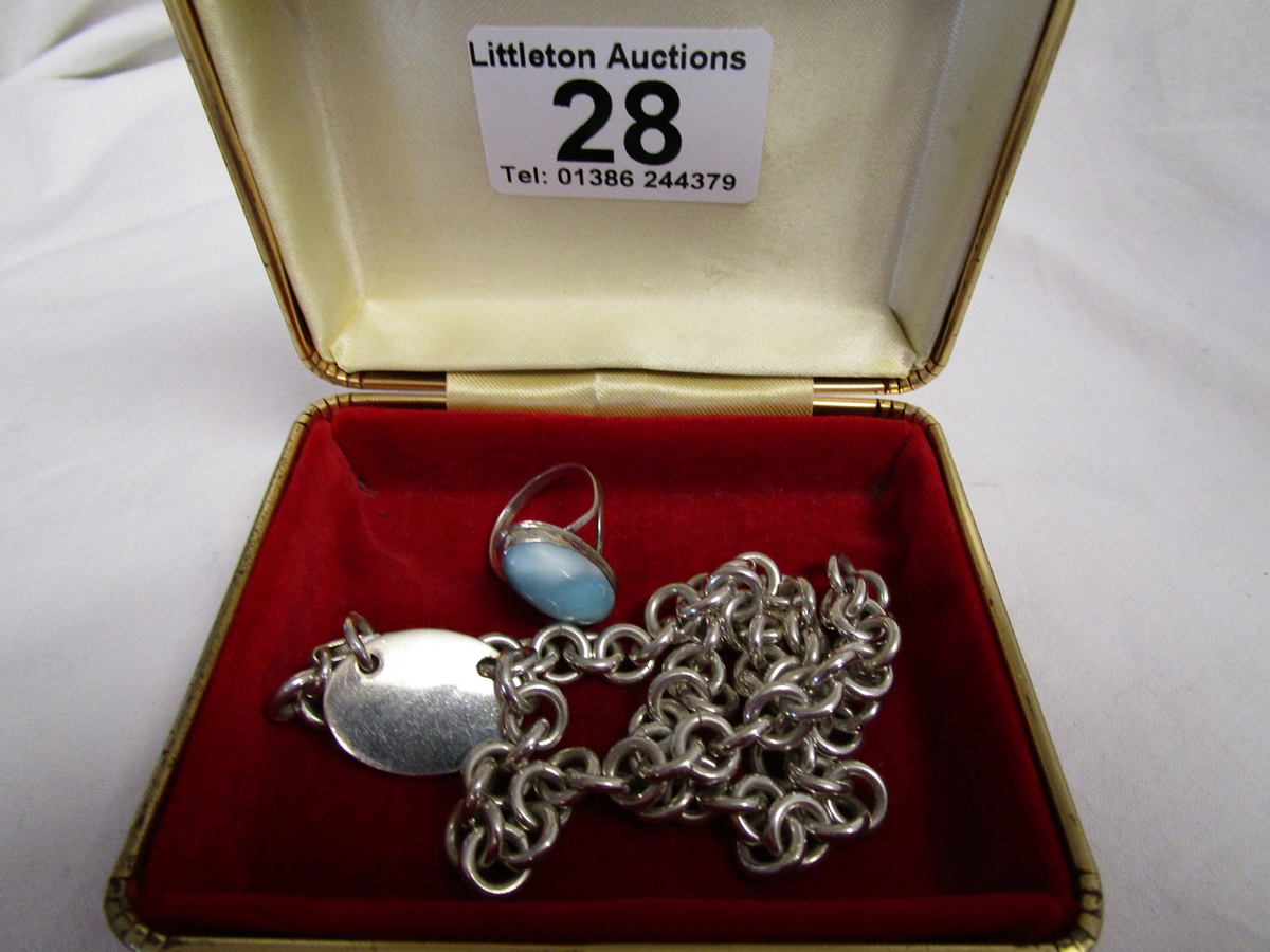 Heavy silver chain with stone set silver ring