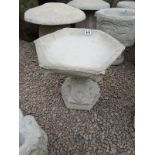 Gothic stone bird bath with hexagonal top