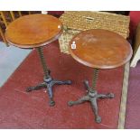 Pair of old cast iron based height adjustable tables
