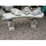 Curved stone pedestal squirrel bench