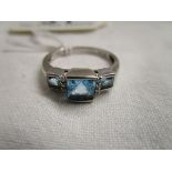 White gold blue topaz & diamond set ring