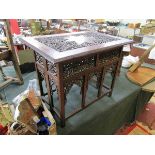 Oriental carved table