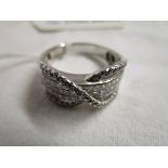 18ct white gold diamond twist ring - princess cut diamonds