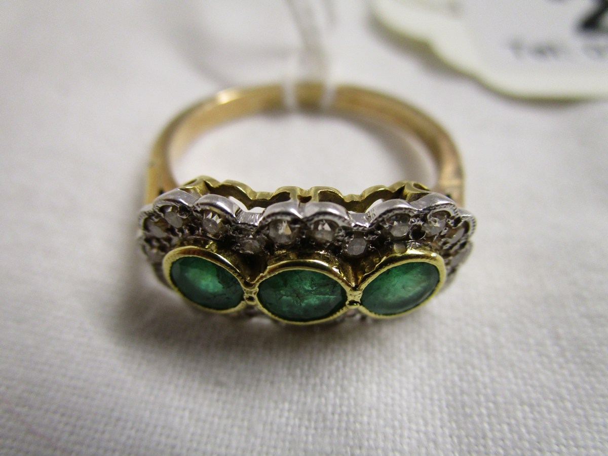 18ct diamond and emerald ring