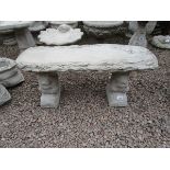 Stone pedestal squirrel bench