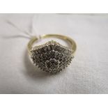 Gold diamond cluster ring set with baguette diamonds