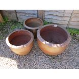 3 large brown terracotta planters