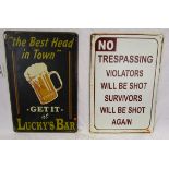 2 novelty tin signs