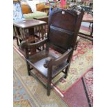 Early oak folk art armchair