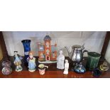 Shelf of collectables to include paperweights etc