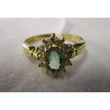 18ct diamond & emerald cluster ring