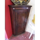 Early oak corner cupboard