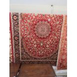 Red ground Keshan rug (1.9 x 1.4)