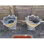 Pair of stone pedestal planters