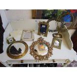 Collection of picture frames and mirrors