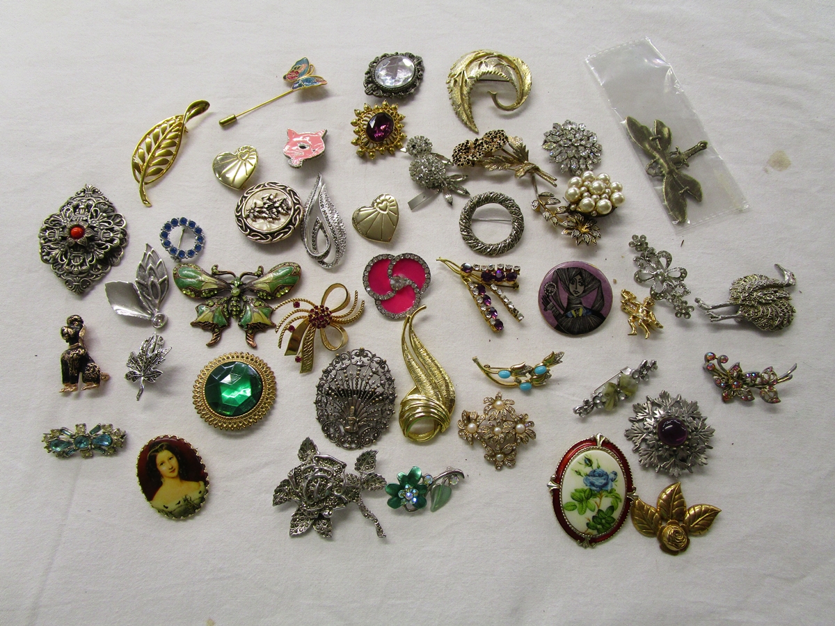 Box of costume brooches