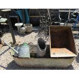 Various metalware to include large tin bath, wheelbarrow watering cans etc