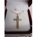 Gold & diamond set cross on gold chain