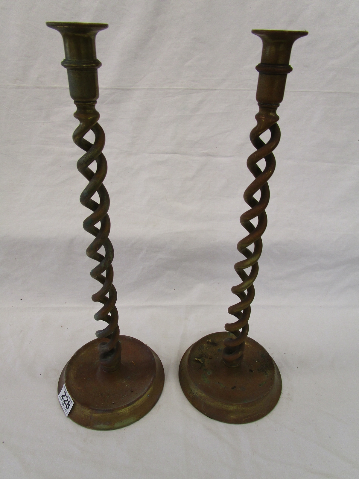 2 ornate brass candlesticks