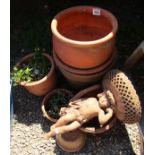 Terracotta pots and cherub