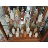 Collection of early stoneware bottles to include Cheltenham & Kidderminster